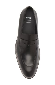 Rich calfskin leather elevates an Italian-crafted penny loafer that will make the perfect addition to your everyday office wardrobe. Leather upper and lining/leather, rubber and synthetic sole   Made in Italy   Hugo Boss/BOSS/HUGO has received the Fair Labor Association accreditation, which signifies that the company has effective systems and procedures in place to successfully uphold fair labor standards throughout its supply chains, including strategies and tools to address and improve working Business Loafers With Leather Sole, Classic Leather Loafers For Business, Classic Leather Loafers For Business Meetings, Modern Calf Leather Moccasins For Business Casual, Modern Calf Leather Loafers For Business Casual, Business Slip-on Moccasins With Branded Insole, Modern Moc Toe Moccasins For Work, Modern Calf Leather Loafers For Business, Classic Leather Oxfords For Business Meetings