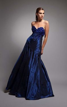 Our strapless “Christina” gown in sapphire silk taffeta shows off an array of fluttery floral embellishments that reach across the bust and down the torso toward the waist | party dresses | | cocktail dress | | dresses | | evening wear | #partydresses #cocktaildress #eveningwear http://www.tonyhamawy.com/ Glamorous Taffeta Evening Dress With Fitted Bodice, Wedding Gown In Taffeta For Gala, Wedding Gala Taffeta Gown, Fitted Bodice Taffeta Evening Dress For Party, Glamorous Taffeta Gown For Party, Glamorous Taffeta Prom Evening Dress, Glamorous Floor-length Taffeta Evening Dress, Glamorous Taffeta Evening Dress For Formal Occasions, Taffeta Dress For Gala Party