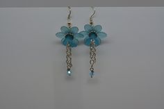 Flower Earrings Lucite Flower Earrings Blue Flower Earrings Blue Dangle Earrings.  Perfect lightweight summer time earrings.  Robins egg blue lucite flowers are joined with silver colored findings to make these cute earrings that are just perfect with a flowing sun dress or just as perfect with t-shirt and shorts. Blue Flower Charm Drop Earrings, Blue Flower Earrings Nickel Free, Blue Flower Earrings For Pierced Ears, Handmade Blue Dangle Flower Earrings, Blue Flower-shaped Earrings With Ear Wire, Blue Flower Earrings For Jewelry Making, Light Blue Dangle Earrings For Pierced Ears, Blue Dangle Flower Earrings, Handmade Light Blue Drop Flower Earrings