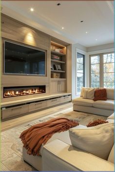 a living room with two couches and a fireplace