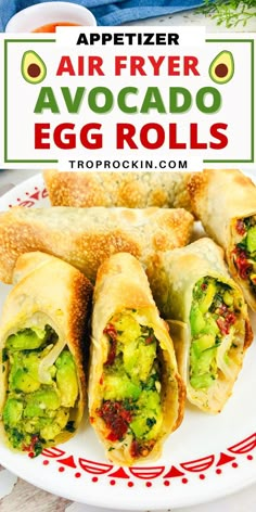 an appetizer with broccoli and egg rolls on a white plate next to other food items