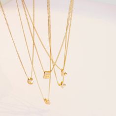 A perfect personalized piece. Add any initial of your choice to our delicate gold chain. This is the perfect gift idea for your best friend, sister, mother and daughter. …………………………………. Details: Available in Gold Plated Curb Chain Pendant is Matte Gold Plated measuring 5 x 7.5mm Size inclusive and made to order just for you Not waterproof Average necklace length is 18" About Your Jewelry If you are not wearing your jewelry it is best to store it in a cool, dry place such as your gift box that is