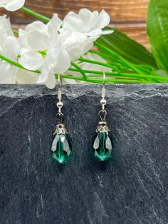 Upgrade your everyday look with these handmade Green Teardrop Earrings. These simple yet stylish earrings feature a stunning teardrop shape in a vibrant shade of green, adding a pop of color to any outfit. Whether you're headed to the office or meeting up with friends, these earrings are the perfect accessory for every day. The high-quality craftsmanship ensures durability, while the lightweight design offers comfort all day long. Elevate your style effortlessly with these Green Teardrop Earrings. Message me for more accurate measurements of this product. Green Teardrop Drop Earrings For Jewelry Making, Green Teardrop Drop Earrings Nickel Free, Handmade Green Teardrop Earrings, Green Nickel-free Teardrop Drop Earrings, Green Nickel-free Teardrop Earrings, Green Teardrop Earrings For Pierced Ears, Gift, Green Teardrop Earrings For May Birthstone, Nickel-free Green Teardrop Pendant Earrings, Elegant Green Hypoallergenic Teardrop Earrings