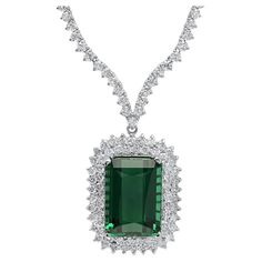 29.20Ct Natural Tourmaline and Diamond 18K Solid White Gold Necklace Natural Tourmaline Weights: Approx. 20.90 Carats Tourmaline Measures: Approx. 10 x 8 mm Total Natural Round Diamond weights: Approx. 8.30 Carats (color G-H / Clarity SI1-SI2) Total Chain Length is 18 inches Total item weight is: 25 grams Disclaimer: all weights, measurements and colors are approximate and may vary slightly from the listed dimensions or as seen in the image. All pictures are magnified to show the smallest of det Dazzling Formal Emerald Gemstone Necklace, Elegant Emerald Cut Emerald Necklace For Formal Occasions, Elegant Baguette Cut Emerald Necklace For Formal Occasions, Elegant Baguette Cut Emerald Necklace For Formal Events, Formal Hallmarked Emerald Necklace, Elegant Formal Baguette-cut Emerald Necklace, Emerald Diamond Necklace For Formal Occasions, Luxury Emerald Gemstone Necklace For Formal Occasions, Formal Emerald Necklace With Brilliant Cut