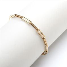 This stylish paperclip link chain bracelet is the best way to spice up any outfit! Wear alone for a classic look, or pair with other metal bracelets for a fun, stacked look! Bracelet Length: 7.5" Clasp Type: Lobster Clasp Material: Stainless Steel Please note: This is a final sale item and no returns or exchanges are accepted for this item. Product requires extended processing and shipping time. Bracelet In Silver, Cable Bracelets, Link Chain Bracelet, Trombone, Metal Bracelets, Wedding Bracelet, Paper Clip, Pure Silver, Spice Up