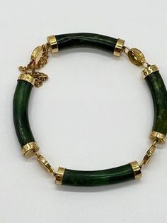 Antique Bracelet Chinese ORIENTAL Symbols Nephrite Antique Jade Vintage Bracelet Nephrite Gold 14k Yellow Gold Green Jade Luck Bracelet Gorgeous vintage jade bracelet with symbols bringing good luck and health. Vintage green Nephrite Jade vintage bracelet with chain clasp and gold-plated baseles, untreated natural Jade. Since ancient times, jade has been considered a stone that cures many diseases, especially kidney diseases. Material: Natural Nephrite Jade, metal (probably 14k gold plated silve Chinese Bracelet, Antique Jade, Elephant Jewelry, Antique Bracelets, How To Clean Metal, Jade Bangle, Nephrite Jade, Jade Bracelet, Vintage Bracelet