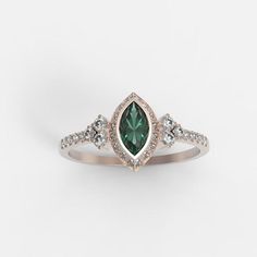 Hey, I found this really awesome Etsy listing at https://www.etsy.com/listing/740526913/diamond-emerald-marquise-band-ring-gold Halo Engagement Ring Emerald, Emerald Halo, Emerald Ring Vintage, Emerald Ring Gold, Diamond Wedding Rings Sets, Lab Created Emerald, Diamond Halo Engagement Ring, Bezel Set Diamond, Emerald Engagement