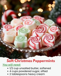 christmas peppermints on a glass platter with holiday lights in the background