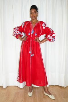 F00161441-204 Red Bohemian Dress With Geometric Embroidery, Bohemian Red Dress With Geometric Embroidery, Red Folk Style V-neck Dress, Red Bohemian Embroidered Dress With V-neck, Red Folk Style Dress For Spring, Red Embroidered Maxi Dress For Festival, Red Embroidered V-neck Dress For Summer, Red Long Embroidered Dress, Red V-neck Embroidered Summer Dress