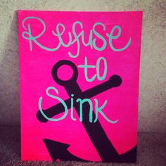 a pink sign that says refuse to sink and an anchor on the bottom with blue writing