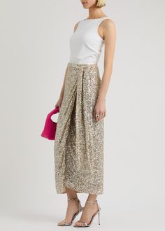 Info & Care Never Fully Dressed tulle skirt Sequin embellishments, fully lined Tie fastening at wrap front 95% polyester, 5% elastane Dry clean Size & Fit Length waist to hem: 37 inches/ 94cm Midweight Slim fit Model is 5'9'/ 175cm and wears a size UK8 Never Fully Dressed Wrap Skirt, Skirt Sequin, Midi Wrap Skirt, Never Fully Dressed, Sequin Maxi, Wrap Skirt, Tulle Skirt, Fitness Models, Sequin