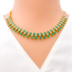 This exquisite 18k yellow gold necklace set, weighing 41.8 grams, features a luxurious design adorned with dazzling diamonds and vibrant emeralds. The yellow gold finish enhances its elegant appeal, making it perfect for any special occasion. The set includes a necklace with a total diamond weight of 2.95 carats, featuring F-G color and VS quality diamonds. The necklace has a length of 15 inches with adjustable 1.1-inch links and is secured with a hook lock. The matching earrings, each measuring Gold Emerald Necklace Hand Set Fine Jewelry, Elegant Green Emerald Necklace In 22k Gold, Elegant 22k Gold Green Emerald Necklace, Elegant Green Emerald 22k Gold Necklace, 22k Yellow Gold Emerald Necklace For Wedding, Elegant 22k Gold Emerald Gemstone Necklace, Traditional Yellow Gold Emerald Necklace For Formal Occasions, Traditional Yellow Gold Emerald Necklace For Formal Events, Gold Bridal Necklace With Emerald Gemstone