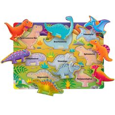 a puzzle board with different dinosaurs on it