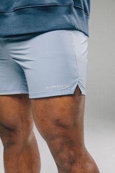 Blue Athleisure Shorts With Athletic Fit, Functional Athletic Shorts With Built-in Liner, Compressive Go-dry Sportswear Shorts, Compression Nylon Go-dry Shorts, Compression Nylon Shorts With Go-dry Technology, Sporty Compressive Shorts With Pockets, Compressive Athletic Shorts With Pockets, Sporty Above Knee Gym Shorts, Athletic Fit Shorts For Running