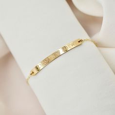 "Coordinate bracelet in 14kt gold filled, rose gold filled or sterling silver. Choose a location that means the most to you! We can also engrave the back with initials or a short saying, just include it in your notes when you check out. This little bar bracelet is engraved with the location of your choice with a Longitude and Latitude . Won't fade, chip or discolor. Wear it all day, everyday! We never take ours off! :) Makes a great gift for bridesmaids, family, friends or a bride-to-be! DETAILS Rose Gold 14k Gold-filled Bracelets As Gift, Rose Gold 14k Gold-filled Bracelet Gift, Dainty Engraved Bracelets For Everyday Wear, Dainty Engraved Bracelets For Everyday, Dainty Engraved Bracelet For Everyday Wear, Dainty Everyday Engraved Bracelets, Personalized 14k Rose Gold Bracelet, Adjustable Rose Gold 14k Gold Filled Bracelet, Adjustable 14k Rose Gold Filled Bracelet