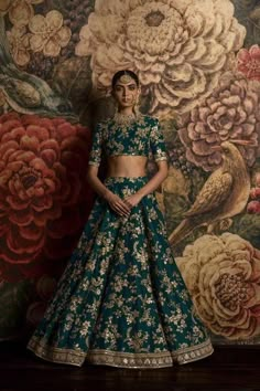 Teal Green Color Bridal Lehenga Choli from Sabyasachi Collection Green Anarkali Set With Gold Embroidery, Designer Gold Choli With Meenakari, Festive Green Traditional Wear With Gold Embroidery, Green Anarkali With Gold Embroidery, Green Sets With Gold Embroidery In Traditional Drape, Festive Green Sets With Gold Embroidery, Green Traditional Wear With Gold Embroidery, Designer Green Lehenga With Meenakari, Traditional Green Wear With Gold Embroidery