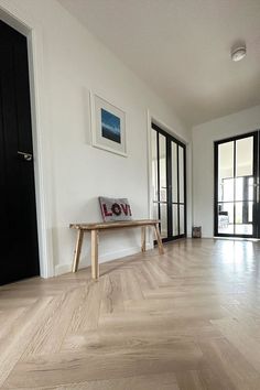 Beautiful image of a hallway way with a close up on the new floor which is a herringbone pattern light wood effect laminate flooring Parquet Flooring, Herringbone Pattern, The Beauty Of Nature