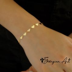 "This beautiful Heart Bracelet features mini mirrored hearts all the way around the wrist! Classic item for every woman! Great gift for Christmas, Mother's Day, Wedding, Baby Shower, Birth of a Child, Valentine's Day, etc. Metal: * 14K Solid Yellow Gold Heart Width : 5mm Clasp: Lobster Claw Length: 7\" ------PRODUCTION TIMELINE-------- Please Allow 1-2 Weeks for Production Shipping Options Available at Checkout" Gold Double Heart Bracelet, Double Heart Bracelet For Mother's Day, Dainty Heart Bracelet For Valentine's Day, Valentine's Day Heart Bracelet For Wedding, Elegant Valentine's Day Heart Bracelet, Minimalist Heart Beads Bracelet, Dainty Heart Bracelet With Jubilee Style, Heart-shaped Charm Bracelet For Wedding, Valentine's Day Rose Gold Heart Bracelet With Jubilee Detail