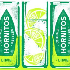 three lime sodas with lemon slices on them