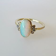 14K Australian Opal Ring w/ Diamond Whiskers Opal Flower Ring, Unique Opal Gemstone Rings, Unique Multi-stone Opal Rings, Unique Opal Ring With Accent Stones, Unique Multi-stone Oval Opal Ring, Artisan Hand Forged Oval Ring, Unique Oval Moonstone Ring With Accent Stones, In The Stars Song, Opal Rings Engagement