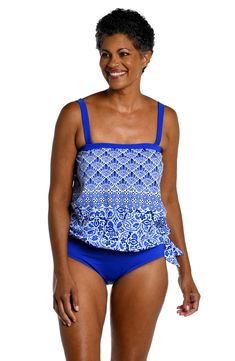 Model is wearing a blue and white multicolored mediterranean tiled printed bandeau blouson tankini top from our Grecian Tile collection. Blue Tankini With Upf 50+ For Beach Season, Blue Upf 50+ Tankini For Beach Season, Blue Tankini With Upf 50+ For Poolside, Blue Tankini With Upf 50+ For Beach, Blue Upf 50+ Tankini For The Beach, Blue Tops For Beach With Upf 50+, Blue Beach Tops With Upf 50+, Blue Printed Tankini For Poolside, Blue Sleeveless Tankini With Upf 50+