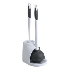 two black and white toothbrush holders sitting on top of each other in front of a white background