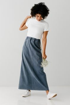 With the look of real denim but the feel of a quality knit, comfort is the key element in our exclusively designed Caroline skirt. The quick, pull on style makes this skirt an effortless option for wherever your day might take you - running errands, making dinner, playing with the kids, or a quick trip to the coffee shop to grab your favorite latte. Soft, comfortable knit denim fabric 65% Cotton 30% Polyester 5% Spandex Heather Grey & Deep Chambray 70% Rayon 25% Polyester 5% Spandex Hand Wash Co Casual Denim Blue Cotton Maxi Skirt, Fall Stretch Medium Wash Skirt, Versatile Cotton Lined Skirt Bottoms, Versatile Cotton Lined Skirt, Everyday Cotton Skirt For Fall, Casual Medium Wash Relaxed Maxi Skirt, Casual Dark Wash Maxi Skirt For Spring, Casual Dark Wash Maxi Skirt With Pockets, Modest Relaxed Fit Bottoms For Spring