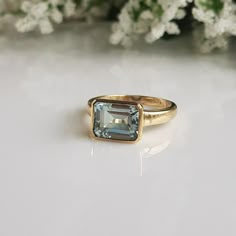 RING DETAILS:✪Design: Gold ring✪Gemstone: Natural aquamarine✪Gemstone color: Blue✪Gemstone size: 8x10 mm✪Gemstone shape: Emerald cut✪Gemstone transparency: Transparent✪Setting type: Bezel setting✪Metal type: 14k solid yellow gold✪Metal finish: Smooth shinyChoose your ring size from drop down menu and if you need any other preferred ring size please contact us.**********************************QUALITY OF MATERIALS:Metal: Most of our jewelry at JewelryMansion is made with precious metals like gold Bezel Aquamarine Ring, Square Gemstone Rings, Gold Aquamarine Engagement Ring, Gold Emerald-cut Topaz Birthstone Ring, 14k Gold Sapphire Ring With Emerald-cut Center Stone, 14k Gold Emerald-cut Sapphire Ring With Center Stone, Emerald Cut Topaz Ring In Yellow Gold, Emerald Cut Yellow Gold Topaz Ring, Emerald-cut Yellow Gold Topaz Ring With Bezel Setting