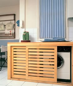 a washer and dryer in a small room