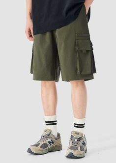 Experience functionality and style with our Cargo Utility Shorts, complete with a zippered pocket for the modern man on the go. 

Crafted from a breathable blend of 90% nylon and 10% spandex, these shorts feature a low waist, loose straight fit, and ice silk quick-drying properties for ultimate comfort. The edgy design includes a durable dual-duty stitch, ample storage with a large utility pocket, and a classic straight-cut hem for a relaxed silhouette. Versatile and comfortable, these shorts ar Utility Shorts, Edgy Design, Shorts Cargo, Low Waist, Modern Man, Straight Cut, Army Green, The Go, The Modern