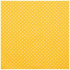 a yellow background with white polka dots