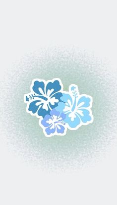 a blue and white flower sticker sitting on top of a green background with the words,