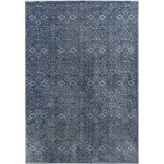 a blue rug with an intricate design on the top and bottom, it is made out of