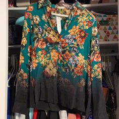 This Is A Beautiful Green Floral Blouse. Never Been Worn, Brand New. Smoke Free Home Silk Button-up Shirt With Floral Print, Elegant V-neck Shirt With Floral Print, Silk Button-up Top With Floral Print, Silk Floral Print Button-up Tops, Chic Multicolor Blouse With Button Closure, Elegant Multicolor Shirt With Button Closure, Elegant V-neck Floral Print Shirt, Chic Multicolor Blouse With Buttons, Multicolor Silk Button-up Blouse