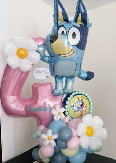 an inflatable balloon with a dog and flowers on it