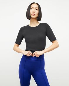 Choe Top - Eco 365Knit :: Black – M.M.LaFleur Fine Knit Stretch Crew Neck T-shirt, Ribbed Crew Neck Top With Minimal Stretch, Fine Knit Workwear Tops With Minimal Stretch, Ribbed Crew Neck Athleisure Top, Seamless Second-skin Crew Neck Top, Versatile Top With Ribbed Crew Neck, Modern Ribbed Crew Neck Top, Fine Knit Crew Neck Top With Minimal Stretch, Crew Neck Athleisure Tops For Work