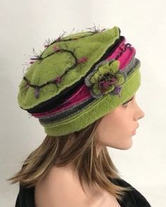 This boiled wool winter hat will be the ideal finish to your outfit. The hat is colored lime green, pink, gray and black. On the side of the hat a flower worked in wool, the background is embroidered in matching color wool. Size for head circumference 53-59 cm, stretchy, covers the ears well. Pleasant, soft and warm. It is possible to coordinate it with mittens and scarf. Dry clean or by hand in cold water. Green Winter Hat, Country Hats, Funky Hats, Woman Hat, Hat Fits, Wool Caps, Unique Hats, Wool Winter, Boiled Wool