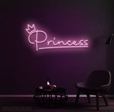 there is a neon sign that says princess on the wall next to a chair and table