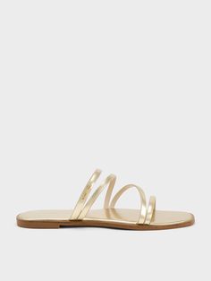 Gold Flat Mules For Spring, Gold Slide Mules For Beach, Trendy Gold Flip Flops For Summer, Elegant Gold Open Toe Slides, Elegant Summer Vacation Slides, Gold Casual Slide Sandals, Gold Mules For Beach In Spring, Gold Mules For Spring Beach Occasions, Trendy Gold Sandals For The Beach