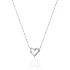 This beautiful dainty heart necklace has 13 bezel set diamonds. Wear this by itself or layer it with another one of your favorite pieces.__________________________________________M A T E R I A L & L E N G T HAvailable in 14k Yellow Gold, 14k Rose Gold, 14k White GoldPendant: 12 mm x 11 mm ( 0.5 inch x 0.45 inch )Stone: 13 Round DiamondsDiamond Size: 1.3 mmCarat Weight: 0.14 ct. tw.Chain: Link ChainChain Length: 14+2, 16+2, 18+2 options or any length up to 20 inches without extension. (Please lea Dainty Heart Necklace, Diamond Heart Necklace, Diamond Initial Necklace, Heart Necklace Diamond, Bezel Set Diamond, Gold Diamond Jewelry, Special Jewelry, Diamond Heart, Quality Diamonds