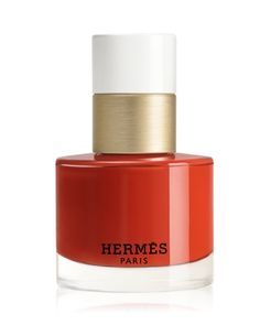 What It Is:Nail polish available in 24 shades inspired by the colors of Hermes enamel.What It Does:The nail polish provides radiant color and a long-lasting lacquered shine. Its fluid texture leaves a fine, smooth film on the nail. Its intense colors contain a high concentration of ultra-fine pigments. Its formula, made in France, is composed of at least 71% ingredients of natural origin.The long and supple rounded brush covers the nail in a single gesture. It enables precise and uniform application. Lacquered with pure color, nails come to life.Protected inside its little orange box, the object designed by Pierre Hardy is poetic and functional. Its white metal cap is engraved with the Hermes ex-libris.How To Use It:To apply the nail enamel, place the brush just above the cuticle, at the c Orange Box, Hermes Orange, Nail Oil, Orange Boxes, Color Nails, Pierre Hardy, Ex Libris, Intense Colors, Objects Design