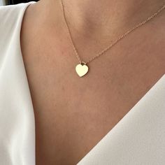 14K Gold Heart Necklace, Minimalist Love Necklace, Wedding Gift The heart shape is universally recognized as a symbol of love and affection. Wearing heart jewelry can indicate a romantic relationship, deep emotional connection, or a loving sentiment toward someone as well as self-love and self-care. Heart jewelry, especially when given as a gift, can symbolize a commitment to a romantic partner or a pledge of loyalty and devotion. It might also represent the idea of giving one's heart to another Pledge Of Loyalty, Relationship Necklaces, Gold Dainty Necklace, Heart Necklace Gold, Romantic Partner, Minimal Gold, Gold Heart Pendant, Romantic Relationship, Turtle Necklace