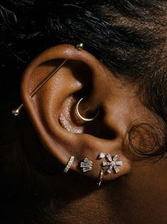 a woman with ear piercings on her ears