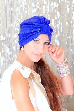 "One part exotic, one part glam...this fashion turban is all parts show-stopping style!! Keep your locks in fabulous condition...and under wraps, in this royal blue sequin turban!! Sparkle in the sunshine, sparkle in the disco light...this piece has it's own magic and looks as great with a white tank as it does with a boho maxi dress!! Tuck your hair up into it for a 1920's take on the item, or let your hair fall loose for a more bohemian vibe. ♥Extra stretchy; one size will fit most...So comfor Bohemian Headwrap Headband For Party, Bohemian Party Headband Headwrap, Summer Party Headscarf One Size, Bohemian Party Hat One Size, Summer Party Headwrap, Bohemian Blue Headpiece For Party, Blue Bohemian Headpieces For Party, Bohemian Blue Headpieces For Party, Summer Bohemian Party Headscarf