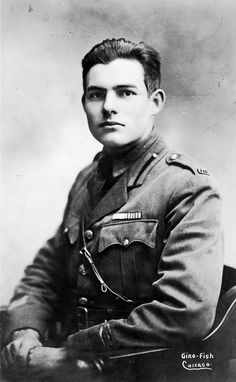 Hemingway was wounded by an Austrian mortar shell at the Italian front on July 7th, 1918. Though hit with 227 pieces of shrapnel, he pulled a wounded Italian soldier to safety, and was later awarded a medal for bravery by the Italian army. He was a non-combatant, charged with delivering rations before the shell hit, and felt that he did not deserve the honor.  For more, check out ERNEST HEMINGWAY: A NEW LIFE: http://www.psupress.org/books/titles/978-0-271-07534-1.html #Hemingway Ernst Hemingway, Man In Uniform, Photos Rares, Beat Generation, Historical People, Fidel Castro, Interesting History, 인물 사진