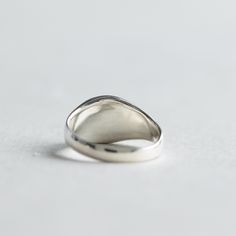 >Modern classic signet ring with hand graving initial. >925 sterling silver hallmarked >Sterling silver is an almost pure metal made from 92.5% Silver. >Approx. 10mmx9mm oval face and 2.5mm band width. FREE SHIPPING USA- All of our jewelry will arrive in custom packaging ready for gift giving. CARE: To prolong the color and shine of your jewelry, avoid contact with perfume, lotion, and water. Store in a bag or jewelry box. SATISFACTION GUARANTEED All pieces are carefully examined pri Timeless Silver Initial Ring, Classic Silver Initial Ring Stamped 925, Classic Sterling Silver Dome Promise Ring, Classic Silver Initial Ring With Polished Finish, Classic Oval Sterling Silver Initial Ring, Silver Classic Signet Ring For Promise, Silver Engraved Timeless Signet Ring, Classic Silver Initial Open Ring, Classic Silver Signet Promise Ring