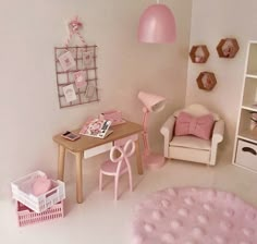 a doll's room with pink furniture and accessories