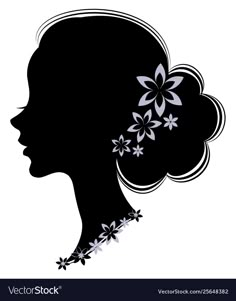 the silhouette of a woman with flowers in her hair