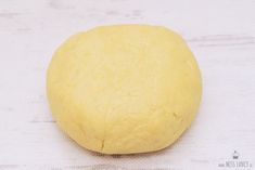 a ball of dough sitting on top of a table