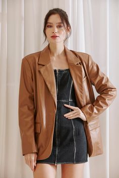 Introducing the Cassandra Faux Leather Oversized Blazer: the perfect statement piece to take your style to the next level. With its ultra comfy oversized design and pocket accents, this blazer is ideal for the office and your after-work plans. This blazer comes in brown. Material:PU & polyester Final Sale – No return / Exchange Elegant Oversized Leather Outerwear, Trendy Brown Single-breasted Blazer, Trendy Brown Single Breasted Blazer, Trendy Single Breasted Brown Blazer, Oversized Chic Business Blazer, Oversized Chic Blazer For Business, Chic Brown Blazer For Business Casual, Chic Oversized Blazer For Business, Chic Brown Blazer With Pockets